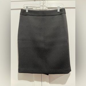 Dark grey winter skirt. Slit in the back